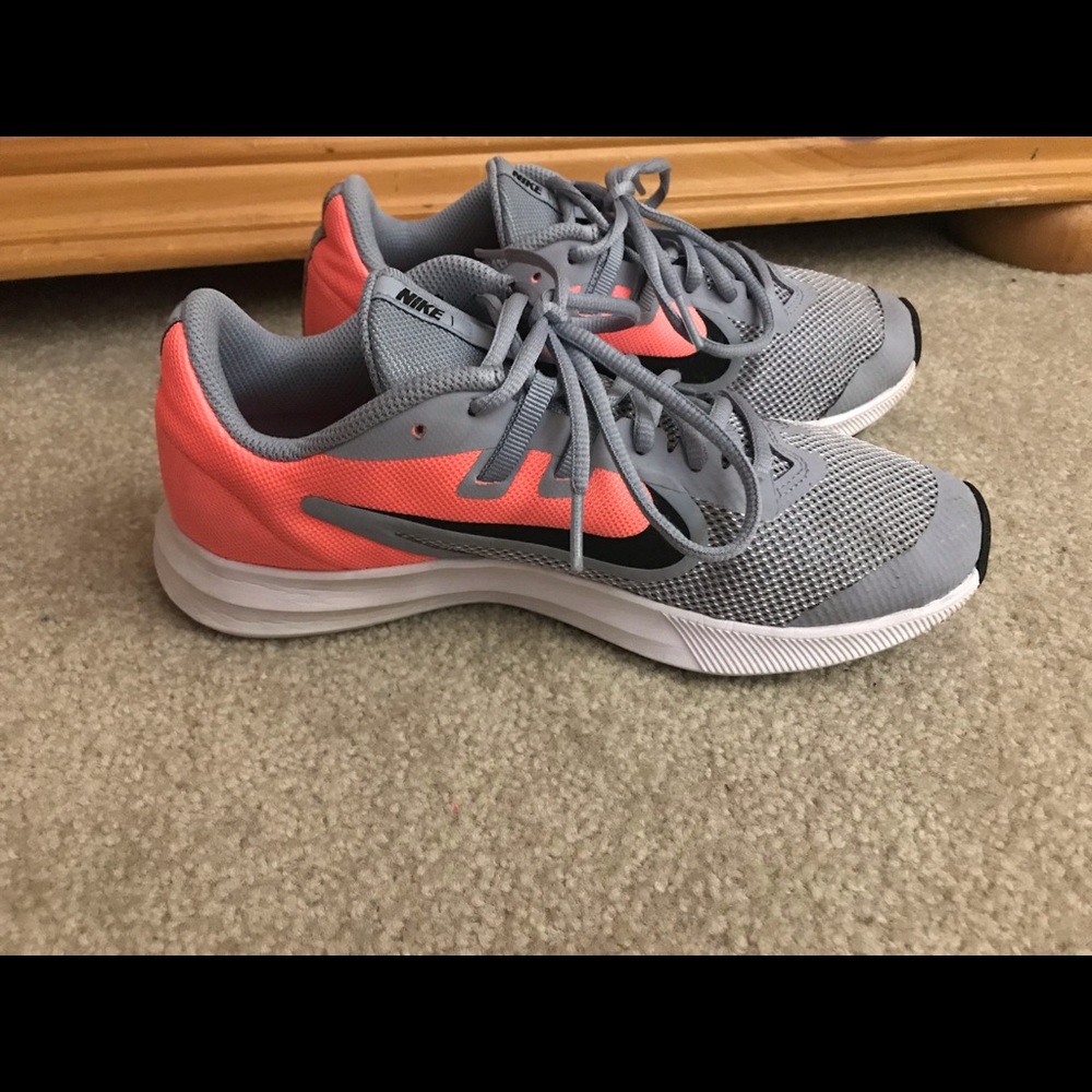 Coral and grey Nikes